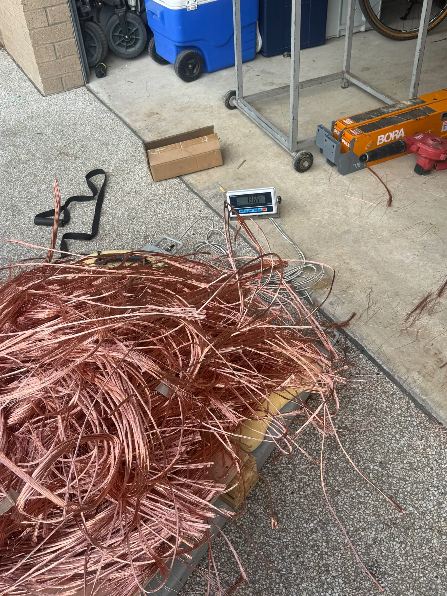 A large quantity of stripped copper wire ready for recycling